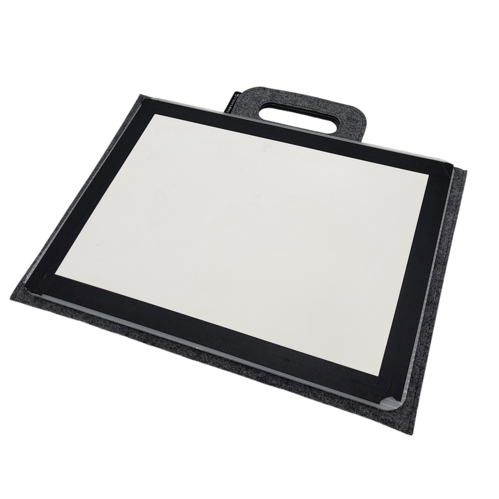Quarter sheet carrier for art supplies by Cup Easels Inc., shows a sturdy, black carrying case designed for art paper storage.