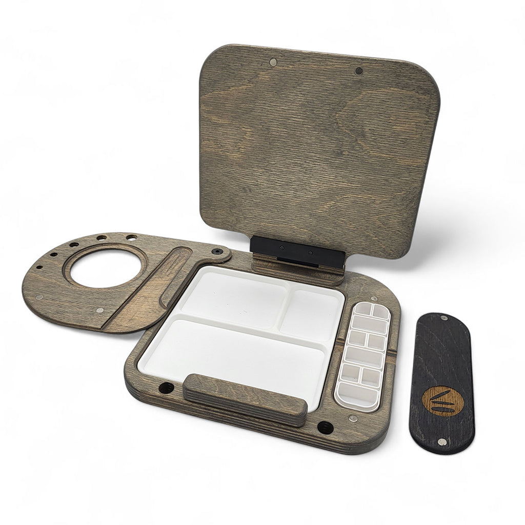Grey Superlite Water Kit by Cup Easels, featuring art supplies arranged for left-handed artists.