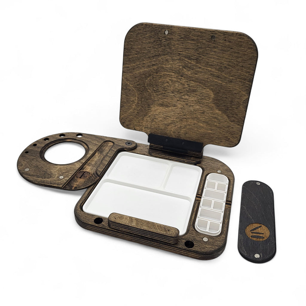 Superlite Water Kit art supplies by Cup Easels, featuring sepia-toned watercolor paints and brushes, displayed on a white background.