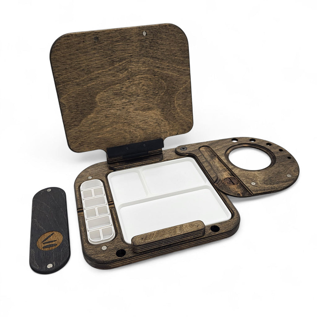 Superlite Water Kit art supplies by Cup Easels, sepia-toned watercolor set with brushes and mixing palette, displayed on a white background.